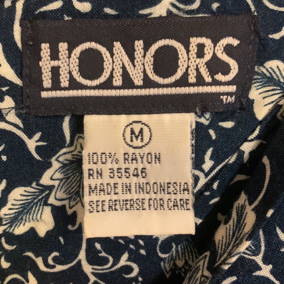 Honors, cute navy blue floral, print romper with ties that can tighten or extend - Picture 3 of 4